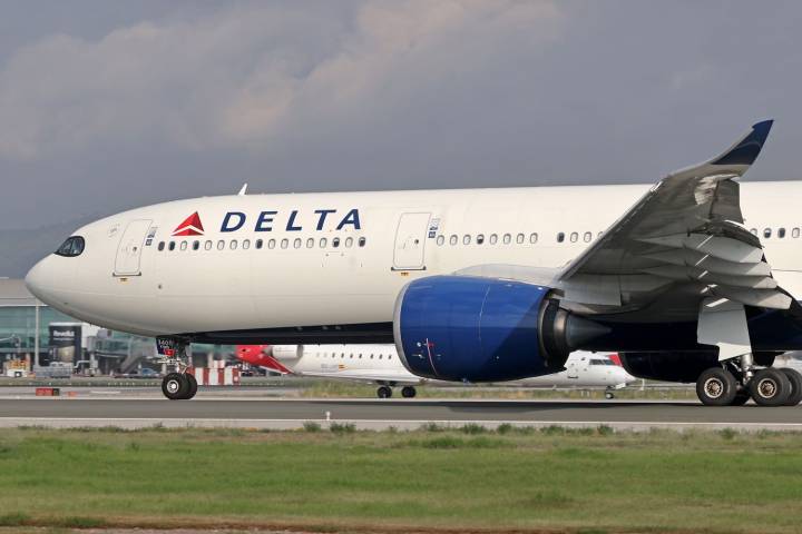 Delta Flight Attendant Accidentally Deploys Emergency Slide Before Takeoff