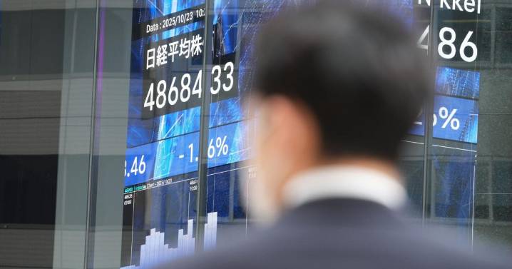 Asian shares retreat and crude prices soar $2 after Trump sanctions Russian oil giants