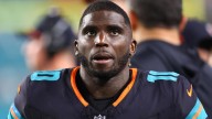 Dolphins' Tyreek Hill explains his unique reaction to graphic knee injury and why he's unsure of NFL future