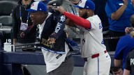 Joe Carter wears Blue Jays' home run jacket after throwing first pitch at World Series Game 2