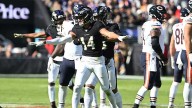 Ravens hold off Bears 30-16 in must-win game to keep season alive.