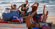 Palestinians return to destroyed Gaza homes as Israel