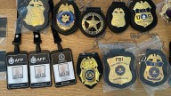 Man, 50, charged after police find fake law enforcement badges and IDs, replica firearms at Double Bay home in Sydney