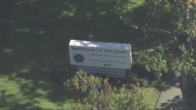 Mass. woman charged with threatening federal agents
