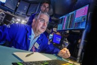Wall Street rallies to recover some of Friday's sell-off after Trump softens his criticism of China