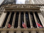 Stocks wobble as trade tensions between U.S. and China escalate