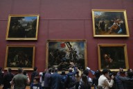 Louvre Museum reopens after heist, as director set to testify to French lawmakers