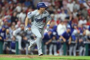 Dodgers hold off Phillies to win MLB playoff thriller