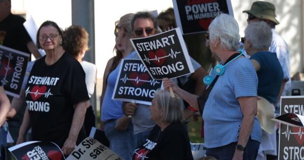 Dozens protesting in support of former Powers Health doctor