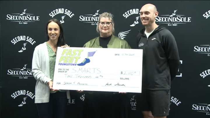 Track and field group donates to two local youth organizations