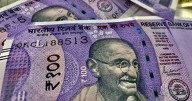 Rupee Rises Sharply Against US Dollar On RBI Intervention