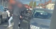Brazen gang posing as cops rob man in broad daylight and flee in fake police car