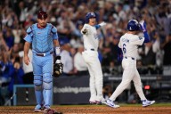 Dodgers advance to NLCS after Kerkering’s costly error in 11th inning beats Phillies