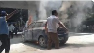 Video of Car catches fire at petrol pump in Punjagutta