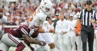 Texas' Manning apparently injured in win against Mississippi State
