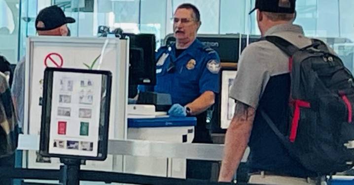 Federal workers stay on job amid shutdown, travelers worry about potential delays