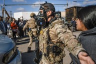 Tensions rise after agents clash with a crowd in Chicago