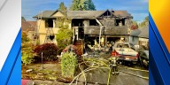 Vancouver home, 2 cars damaged in large fire after reported explosions