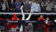 Ryan McMahon flips head over heels into Red Sox dugout to make highlight