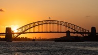 Record heat looms and total fire ban triggered as parts of Australia swelter through soaring temperatures