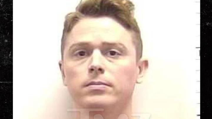 Man Stripped of Nazi Uniform Before Posing for Mugshot