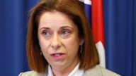 Communications Minister Anika Wells meets with telco giants, introduces new triple