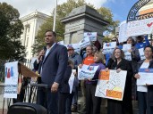 Activists call for action as bill seeking to limit cooperation with ICE stalls on Beacon Hill