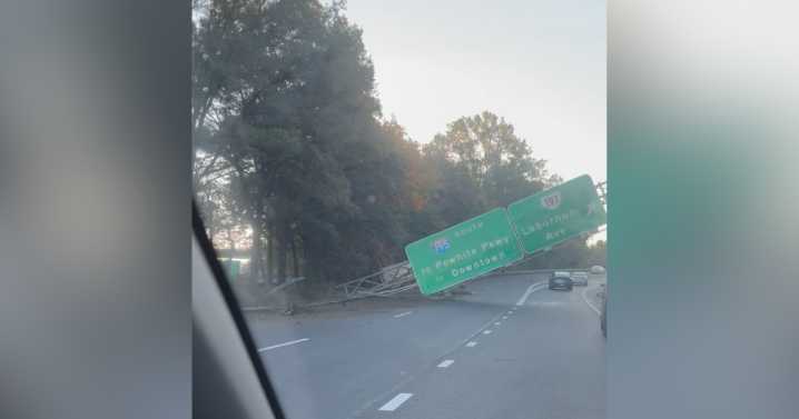Semi wreck snarls traffic on I-64, downs sign on busy exit ramp to Richmond
