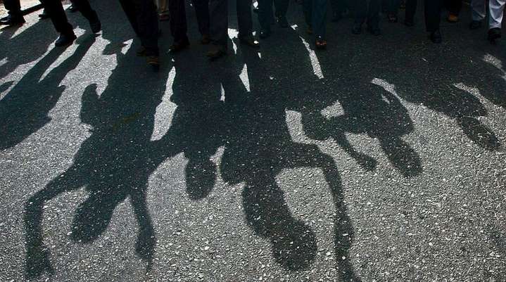 Mob assault policeman after baby death