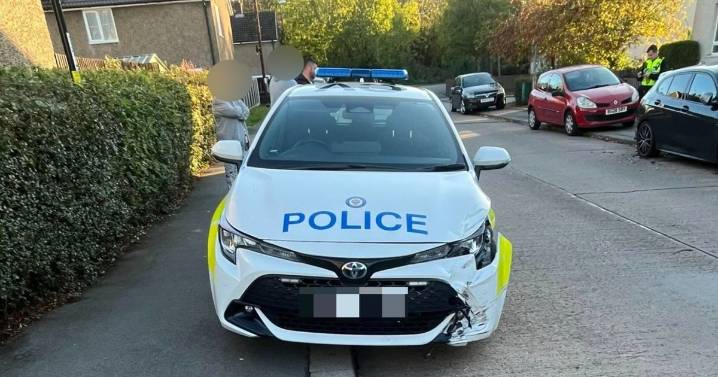 West Midlands Police car crashes into parked BMW in Coventry