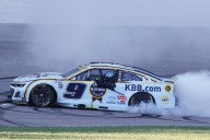 Elliott steals Kansas Speedway race in wild overtime finish, secures spot in 3rd round of playoffs