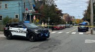 Man on a bike fired a gun at a woman on a bike, leading to a police search Friday for a suspect