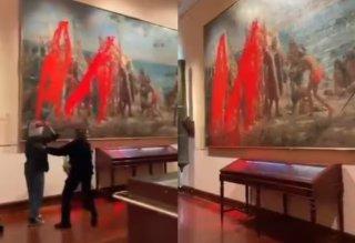 Activistas dañan pintura de Cristobal Colón como protesta por la Fiesta Nacional de España