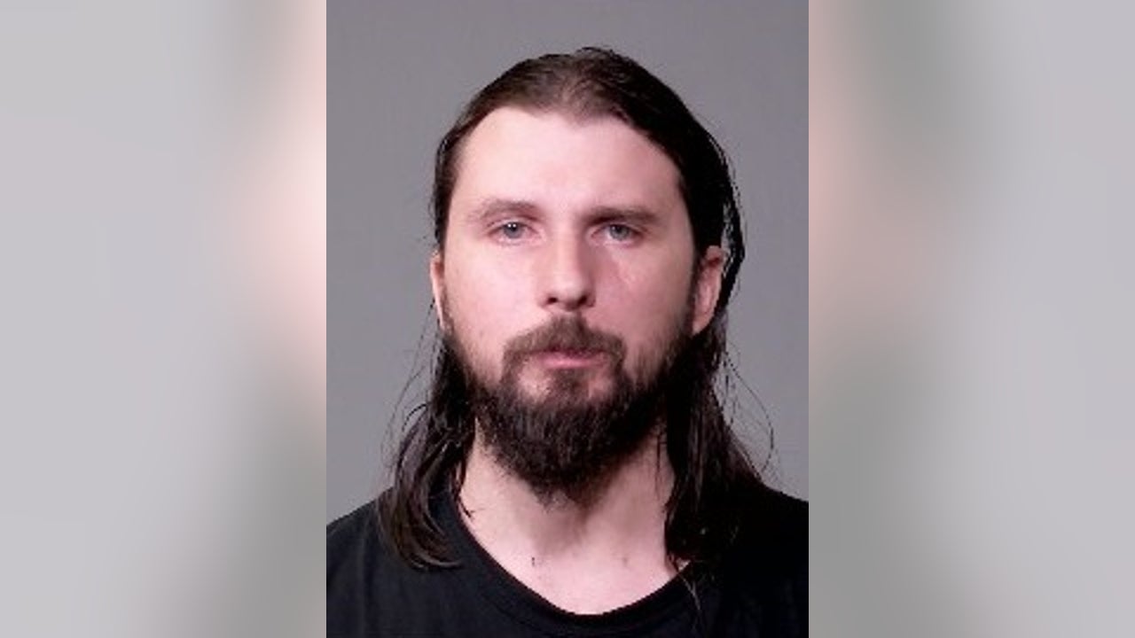 Joliet man charged after hitting, pinning a woman in Walmart parking lot