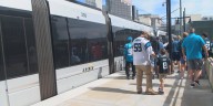 Football fans flood light rail system after CATS vows security upgrades
