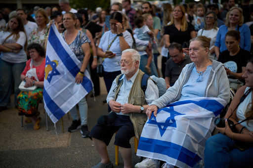 The Latest: Israel prepares to welcome home hostages from Gaza
