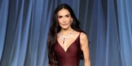 Demi Moore, 62, Dazzles in Plunging Maroon Dress at the 2025 Academy Museum Gala