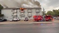 Dallas apartment building badly damaged by 2