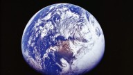 Earth gets darker; why the planet appears dimmer from space