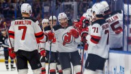 Brown scores 2, Devils hold off Lightning for 1st win of season