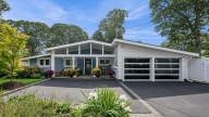 Massapequa house for sale has outdoor living space, one