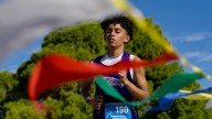 Watch: Runners compete in district cross country meet at Horizon Golf Course
