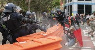 CCTV to identify violent protesters, two police injured