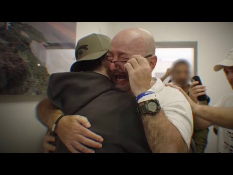 Fathers, sons, and brothers taken as hostages reunite with their families