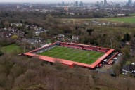 Three arrested after England flag pitch invasion at Salford in alleged protest against Gary Neville