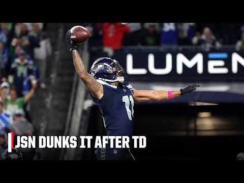 Jaxon Smith-Njigba DUNKS IT to celebrate his TD catch from Sam Darnold🍿