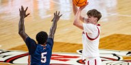 Huskers Cruise Past Midland, 91