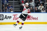 Jack Hughes' hat trick lifts Devils over Maple Leafs