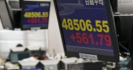 Asian markets mostly higher in quiet holiday trading after AI deals push Wall St to more records