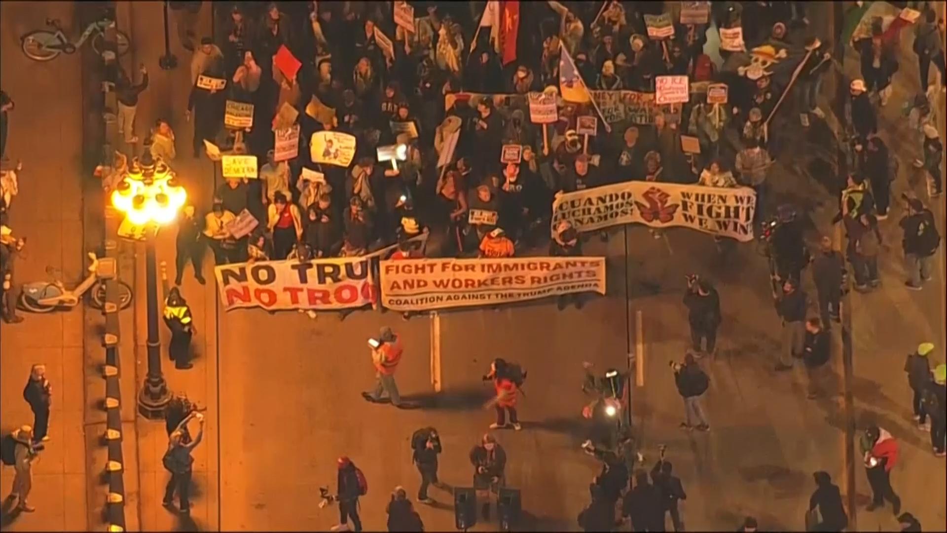 Demonstrators gather and protest against President Trump's deployment of federal troops in Chicago